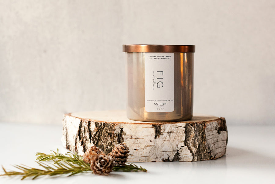 Fig scented 100% soy wax candle in a pearl iridescent tumbler with bronze lid.