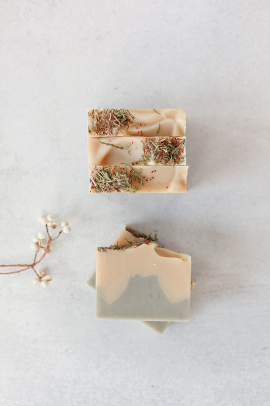 Handmade goat milk soap with pine, mint and clove essential oils