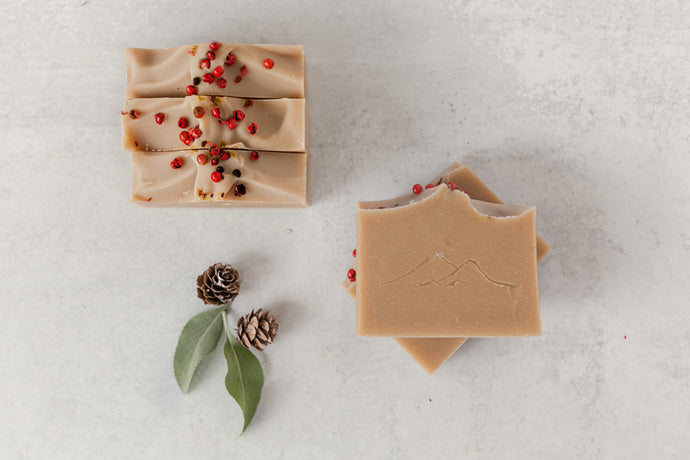 Yuletide Sage handmade beer soap festively decorated with pink peppercorns  on top
